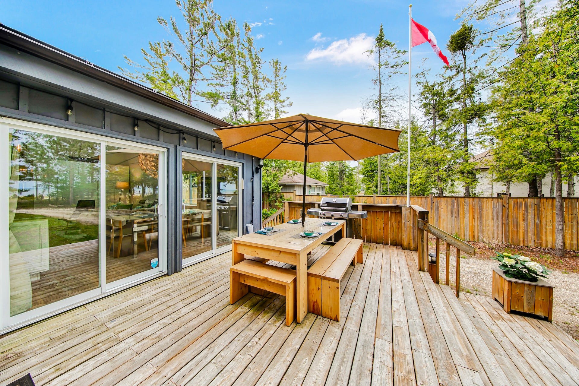 2 huge sliding doors open onto deck